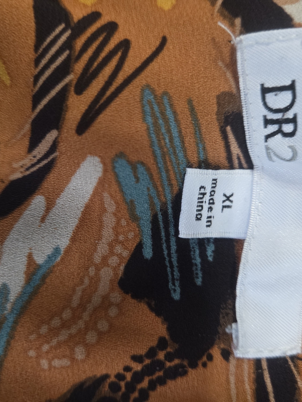 DR2 Burnt Orange Abstract Feather-Print V-Neck Blouse - Picture 3 of 3